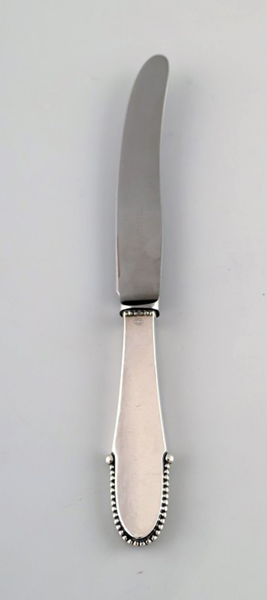 Georg Jensen Beaded fruit knife.: Title: Georg Jensen Beaded fruit knife. Description: Georg Jensen Beaded fruit knife. Measures 17 cm. Stamped. Designed in 1916. In excellent condition. 3 pieces in stock. Reserve: $95.00 Shipping: Do