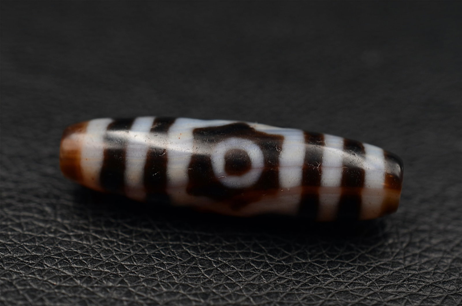 Tibetan three-eye dzi bead (1 of 6)