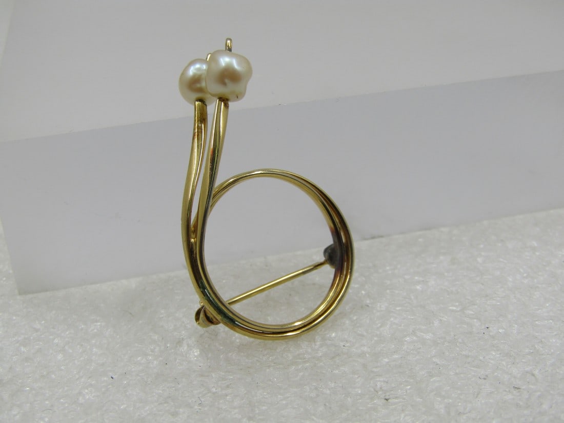 Vintage Napier Double Circle Faux Pearl Brooch, 1960's-1970's, 1.5", 10kt G.F.: Vintage 10kt G.F. Napier Double Circle Faux Pearl Brooch, 1960's-1970's, 1.5" tall and 1" wide. Signed Napier on the pin. It has two freshwater pearl stems that come up from the side of the circle. An