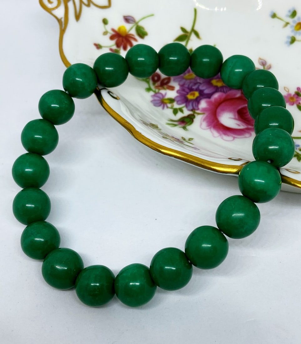 Natural Phoenix Stone Healing Bracelet: Natural Phoenix Stone Healing Bracelet This stone balances Yin and Yang and brings about a lightness of being. Mentally, since it combines malachite, turquoise, chrysocolla, Azurite, Cuprite and other