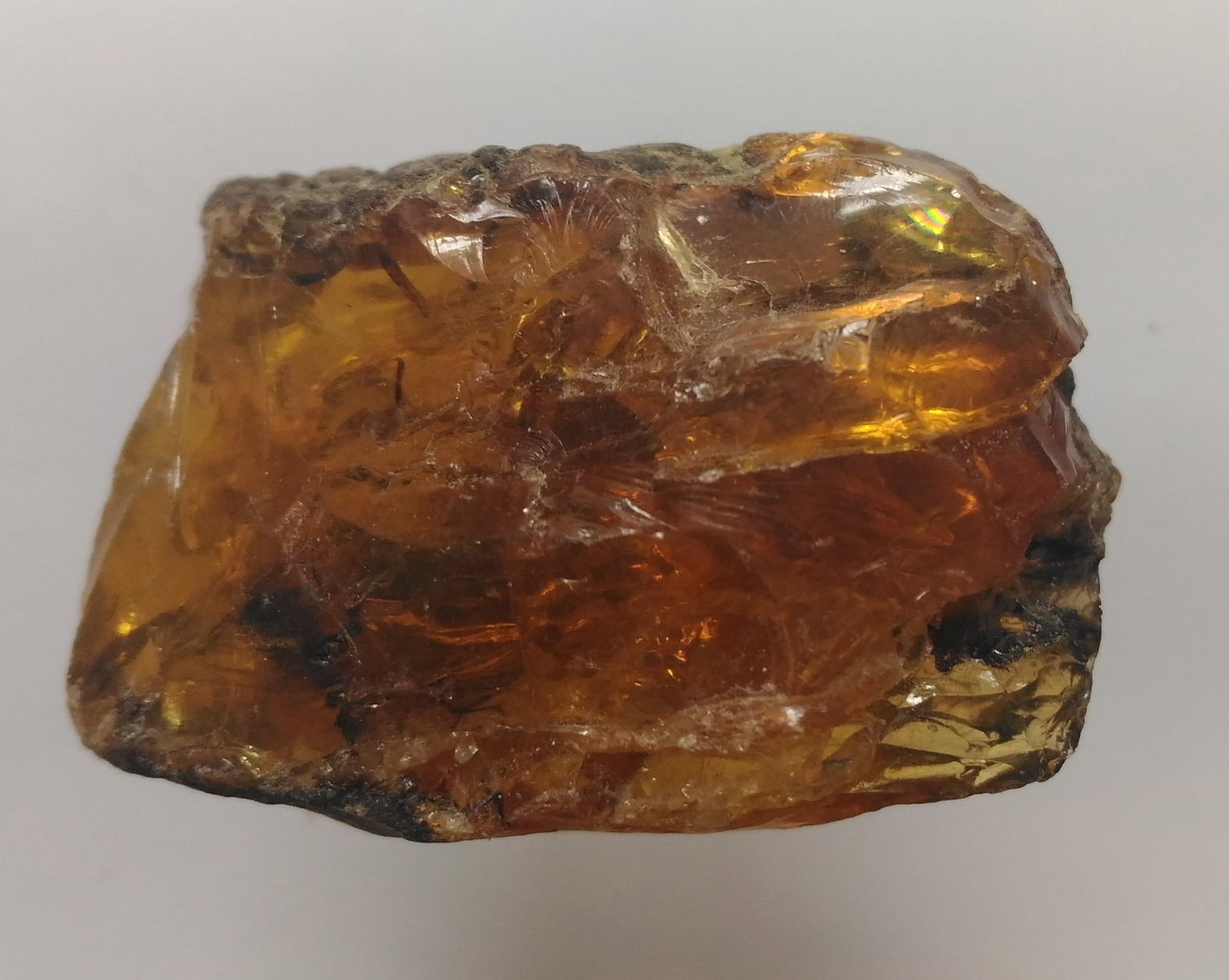8.57 Gram 100 Mill. Years Old Rough Burmite Amber: Title: 8.57 Gram 100 Mill. Years Old Rough Burmite Amber Origin: Hukawang Valley, Kachin State, Myanmar Size: 3x2x2 cm / 8.57 gram Description: dark yellow transparent to translucent rough burmite amb