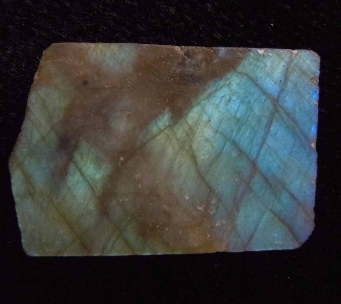 10.49 Gram Iridescent Labradorite: Title: 10.49 Gram Iridescent Labradorite Origin: Ampanihi, Atsimo Andrefana, Madagascae Size: 3x2x0.8 cm /10.49 gram Description: iridescent, multicolor & translucent labradorite Reserve: $5.00 Shippi