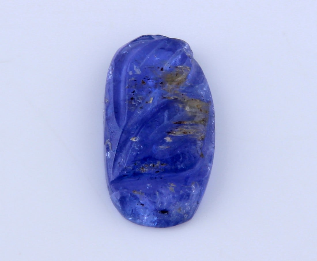Delightful " Natural Tanzanite Carving " 2.55 Cts Natural Tanzanite Carving: No Reserve! Gemstone : Natural Tanzanite Carving Origin: Tanzania Weight : 2.55 carats Dimensions : 13x9 mm Shape/Cut: Fancy Carving Color : Violet Transparency: transparent Treatment: none Shipping: 