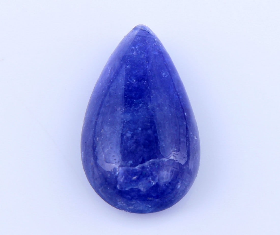 Gorgeous " Natural Tanzanite " 7.73 Cts Natural Tanzanite: No Reserve! Gemstone : Natural Tanzanite Origin: Tanzania Weight : 7.73 carats Dimensions : 17x10 mm Shape/Cut: Pear Cabochan Color : Violet Transparency: transparent Treatment: none Shipping: Domesti