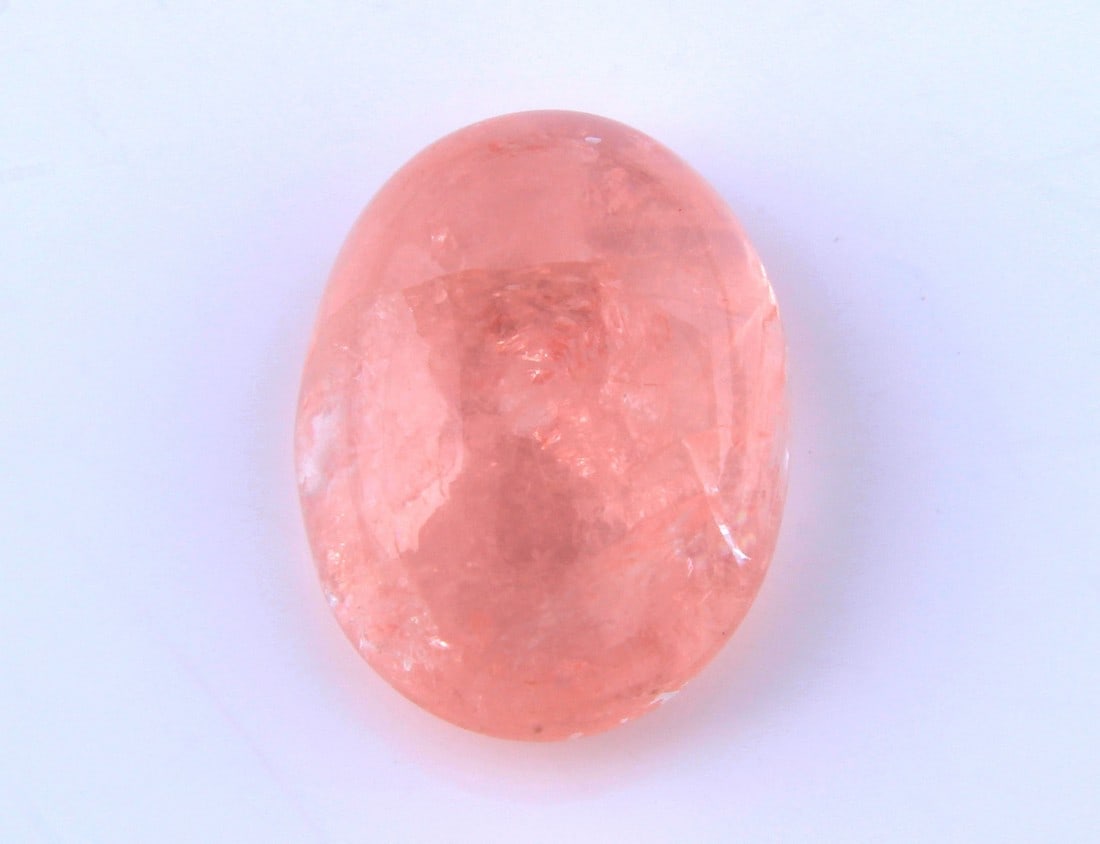 Gorgeous " Natural Morganite " 5.41 cts Natural Morganite: No Reserve! Gemstone : Natural Morganite Shape and Cut : Oval Cabochon Weight : 5.41 carats Measurements : 12.90x9.68x5.84 mm, Color : Peach Transparency : Transparent Treatment : No Treatment Origin
