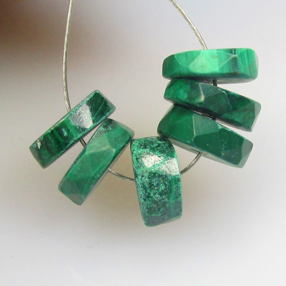 9.41 Ctw Natural Green Malachite Round Beads: No Reserve! Title: 9.41 Ctw Natural Green Malachite Round Beads Stone Clarity: Opaque Gemstone:Natural Malachite Beads Carat Weights: 9.41 Size/Dimensions: 7.00 - 7.20 mm / 6 Pc's Additional Info:Exce