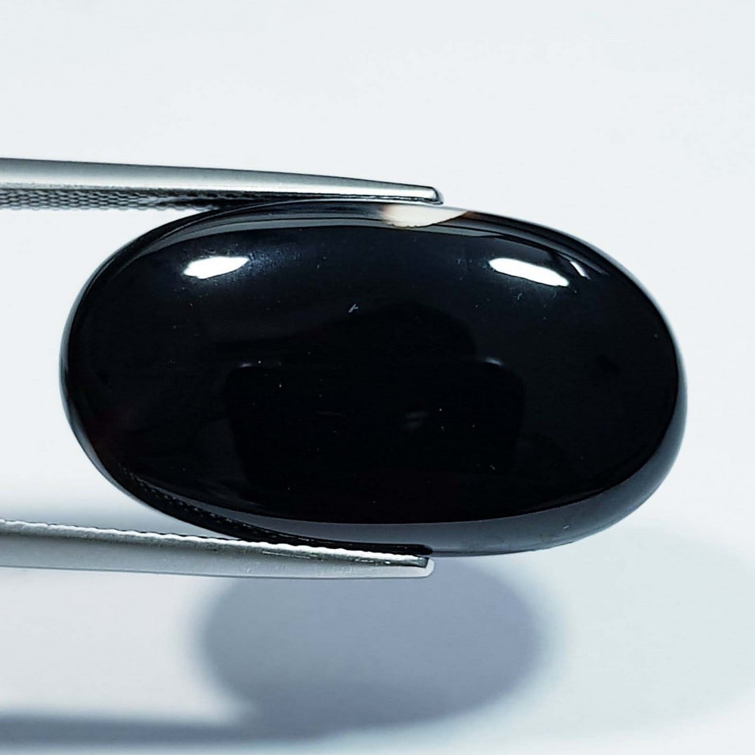 23.98 Ctz Natural Black Lace Agate: No Reserve! Title: 23.98 Ctz Natural Black Lace Agate Color/Clarity: Semi Transparent Gemstone: Agate Carat Weight: 23.98 Dimensions: 27.85 x 15.60 x 6.20 Additional Information: Oval / Brazil S