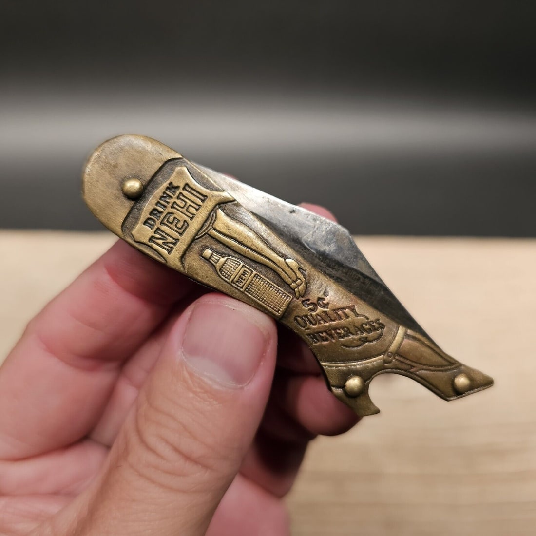 Lady Leg Knife Bottle Opener: 3 1/4" Long closed, 5 3/8" long open x 3/4" wide Nice reproduction brass Nehi boot knife. The heel of the boot is a bottle opener. The knife opens with a pretty strong spring. Blade comes fairly sharp