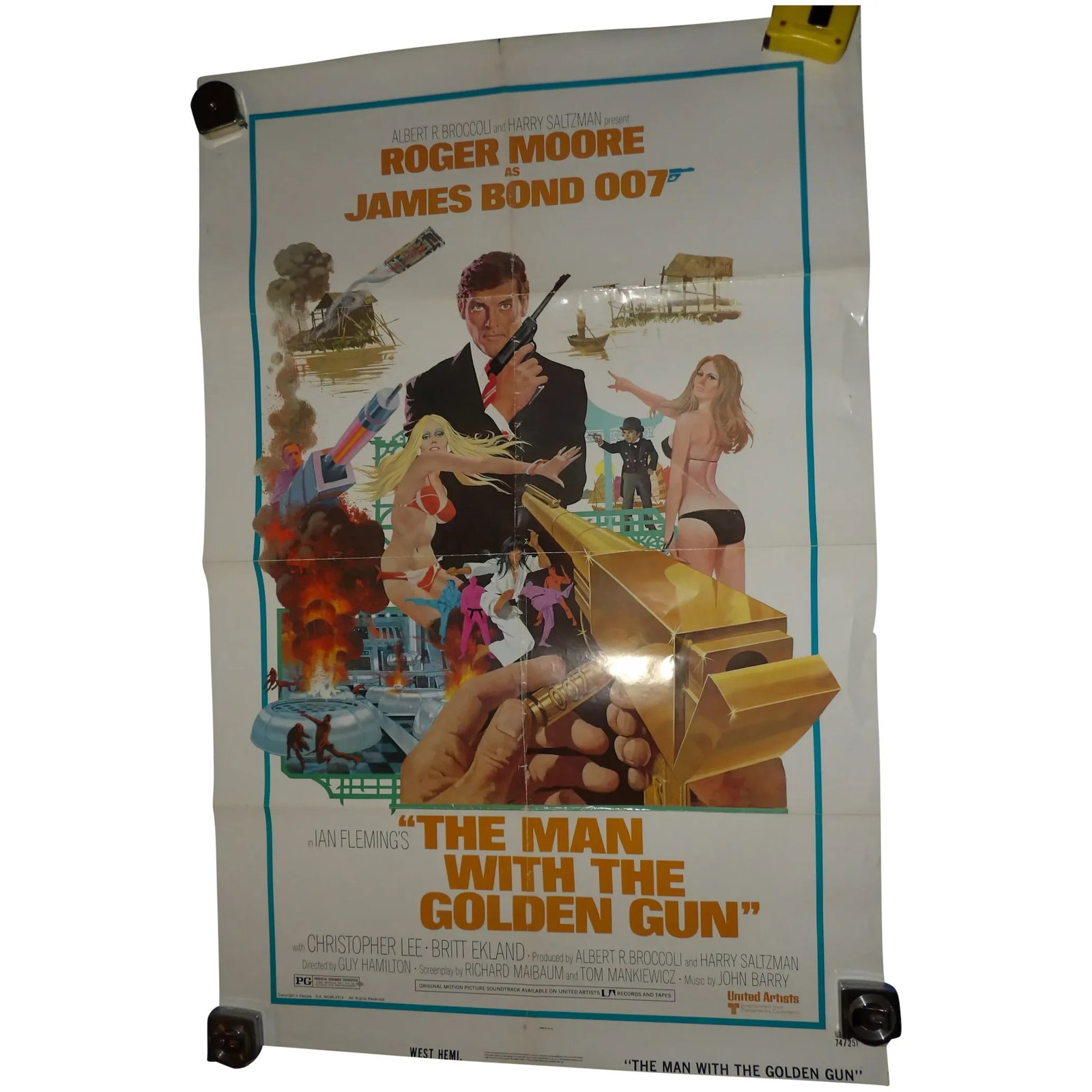 Original 1974 Movie Poster James Bond The Man With The Golden Gun: This is an Original 1974 Movie Poster James Bond The Man With The Golden Gun- in the 70’s poster were folded for shipping to the theaters so this does have crease marks. Color is great and no pi