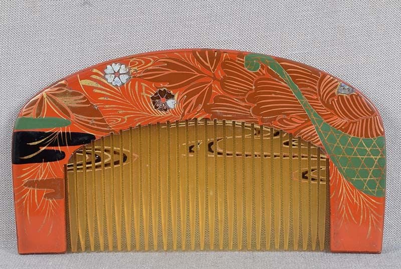 19c Japanese lacquer buffalo horn KUSHI hair COMB flowers: Late Meiji period (1890s 1912) Japanese buffalo horn kushi (hair comb) with lacquer decoration of various flowers, grasses and vaporous clouds, design continuing on the back. Very well made, excellent