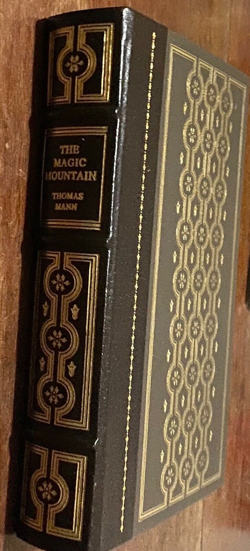 The Magic Mountain The Franklin Library 1981 New Condition Leather Unread Gilt: This is a rare and exquisite collector's edition of "The Magic Mountain" by Thomas Mann, published in 1981 by Franklin Library. The book features a beautiful leather binding and gilt detailing to boar