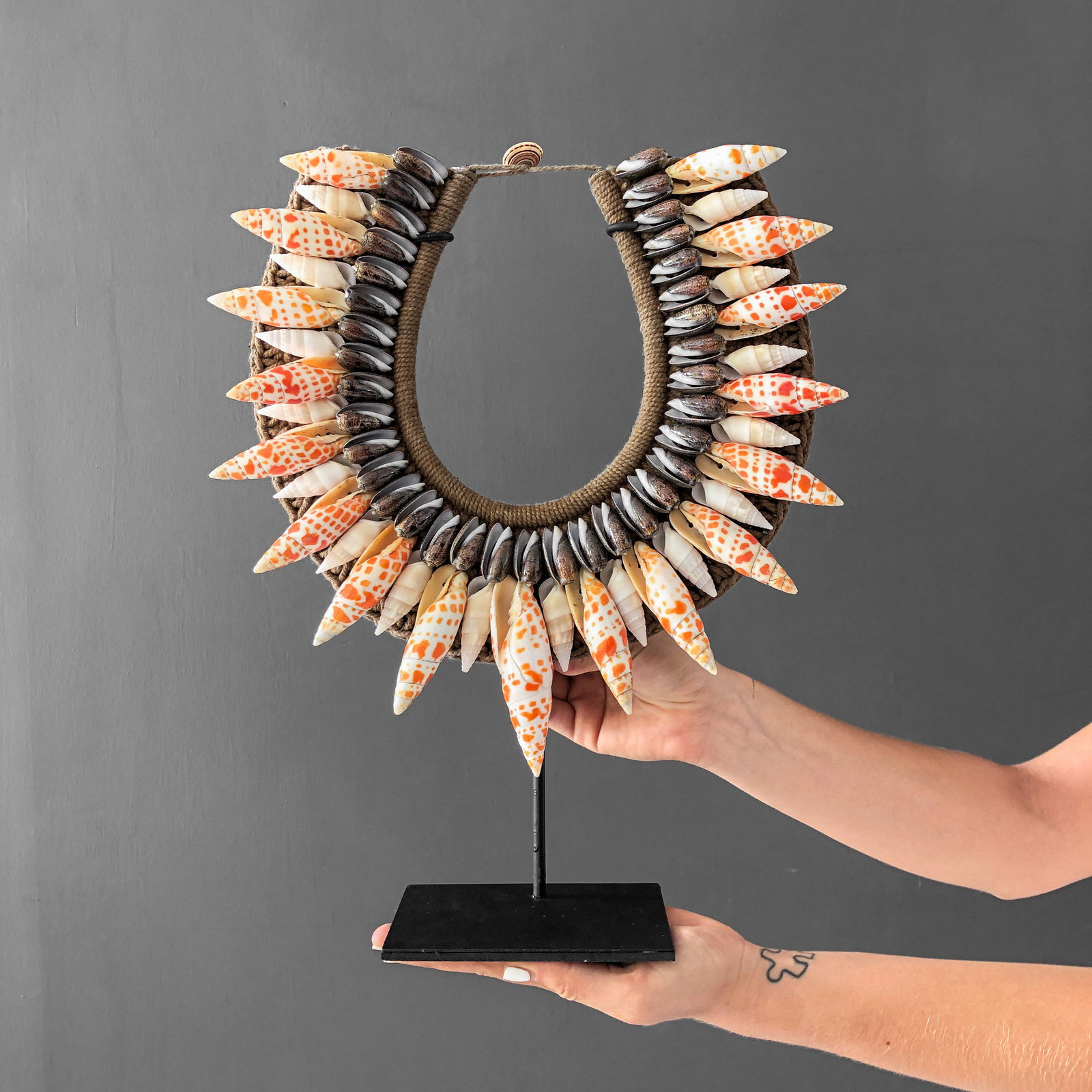 Decorative Papua necklace - Large Burnt Orange Miter Shells: Title: Decorative Papua necklace - Large Burnt Orange Miter Shells Maker: Unknown Origin: Indonesia Date/Period: 2023 Materials: Large Burnt Orange Miter Shells, brown shells, natural fibers, steel Di