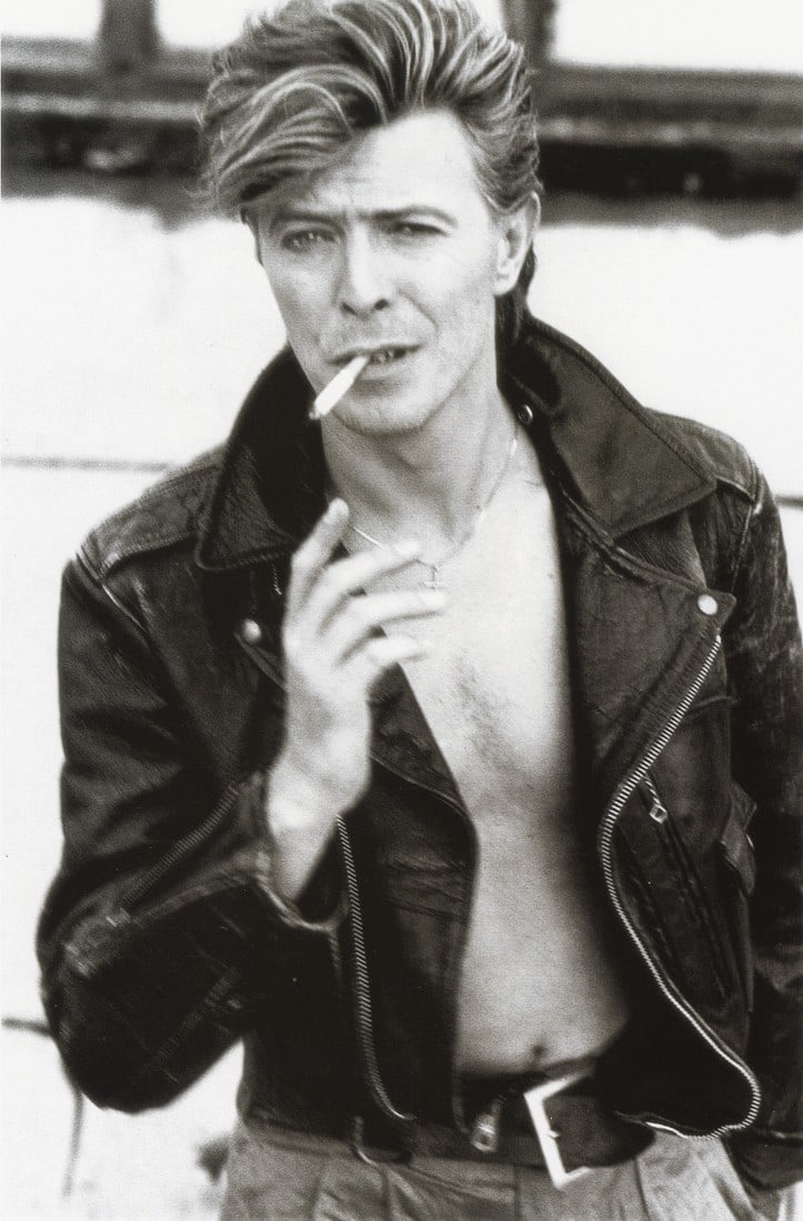 HERB RITTS - David Bowie, 1987: Artist: Herb Ritts Title: David Bowie, 1987 Medium: Photo Litho, 1993, Hong Kong Dimensions: 7.4x11.25" Description: Heat Wax Mounted on 11x14" Conservation Board Artist Bio: Herb Ritts (1952-2002) wa