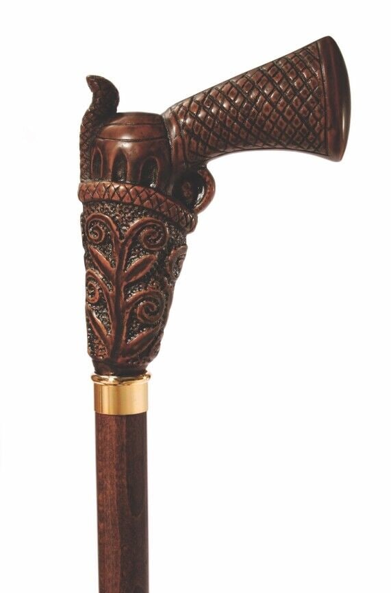 Wood Walking Cane With Gun Handle: This reproduction Italian cane features a firearm handle made of strong cellulose acetate from Italy. It's attached to a sturdy 3/4" beech wood shaft with a walnut lacquer finish and a stylish nickel-