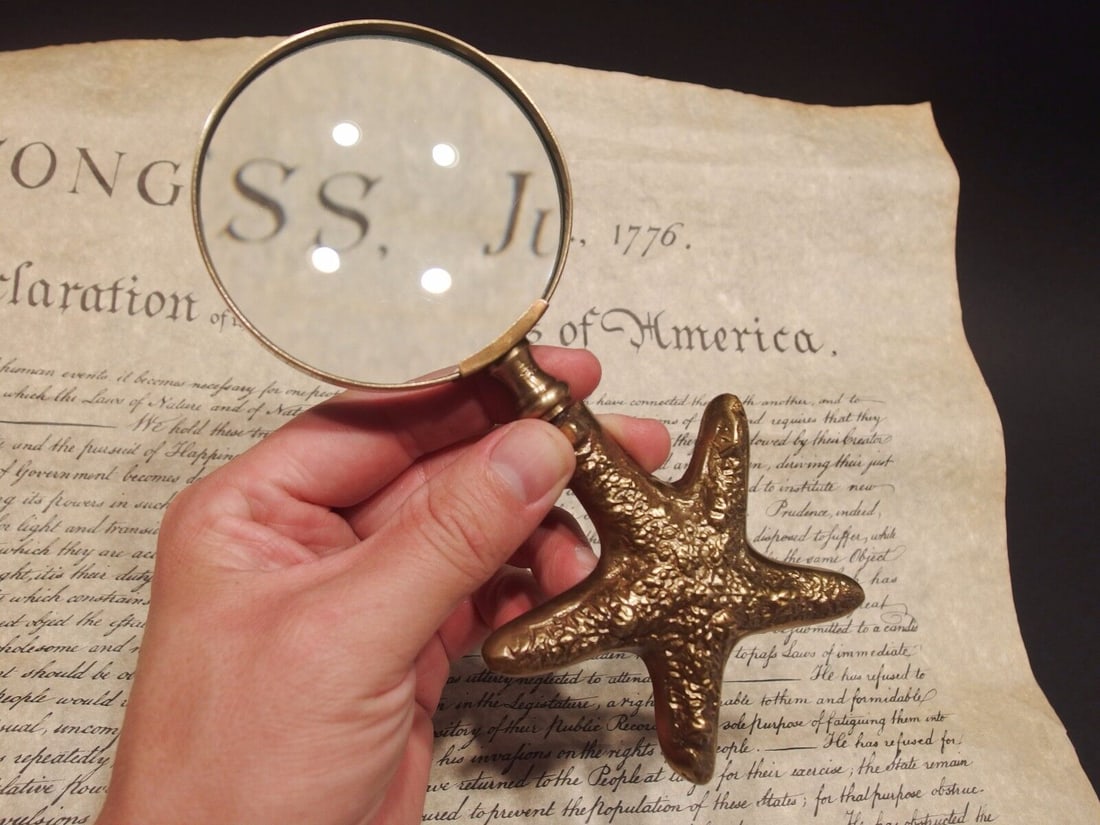Brass Starfish Magnifying Glass Desk Hand Lens: 7" Long x 3" Wide glass Nice reproduction of an antique Magnifying glass with a cast brass starfish handle. Magnifying glasses like this were used in the 18th and 19th century due to the poor lighting