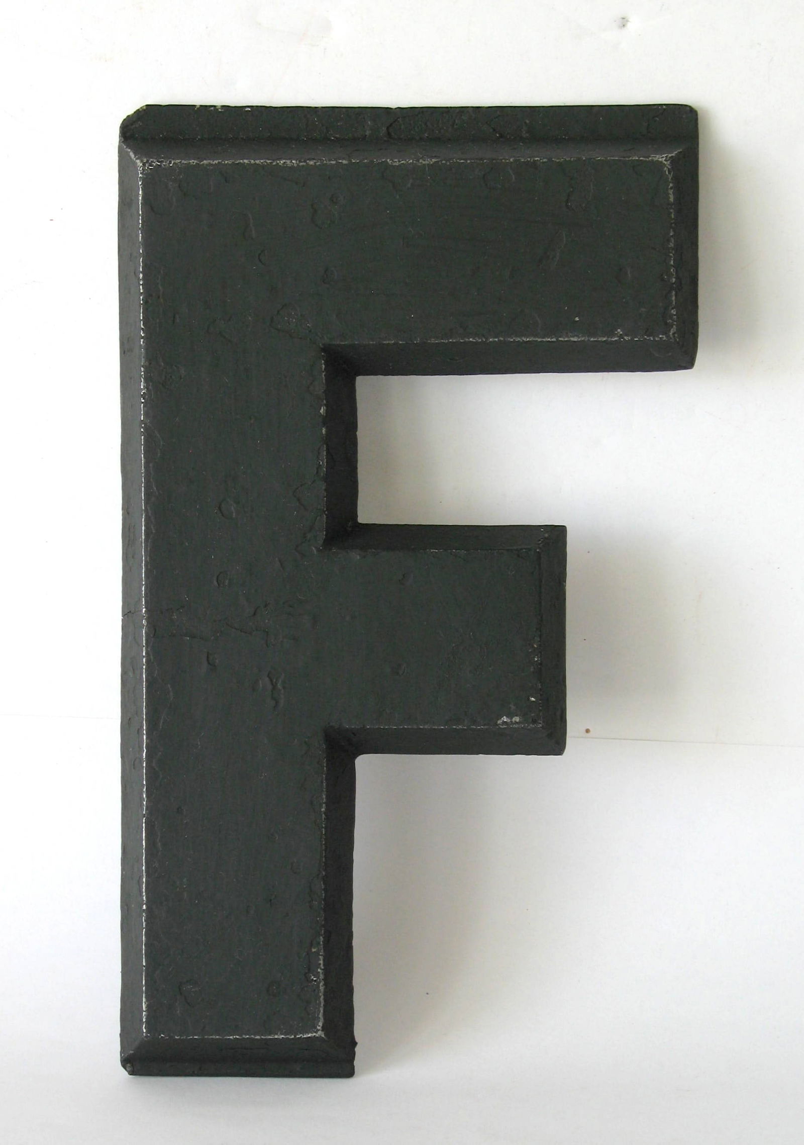 Vintage cast metal letter “F”. (1 of 2)