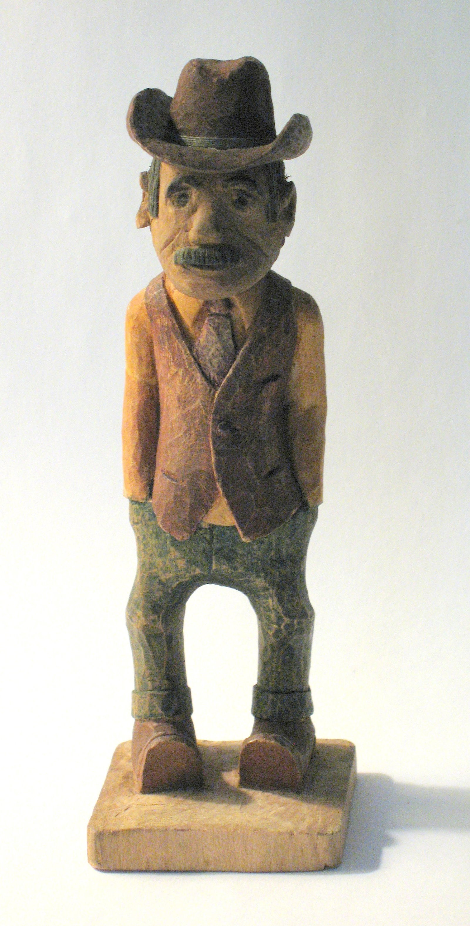 Antique folk art wood carving of a country Gent.: Title: Antique folk art wood carving of a country Gent. Date/Period: 1930's Dimension: 5 1/2” high Additional Information: Nice antique folk art wood carving of a country Gent ready for a night 