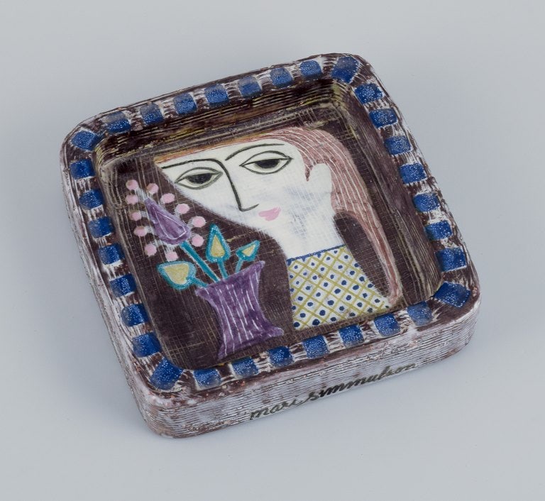 Mari Simmulson (1911-2000) for Upsala Ekeby, Sweden. Ceramic bowl with polychrome glaze. Featuring a: Mari Simmulson (1911-2000) for Upsala Ekeby, Sweden. Ceramic bowl with polychrome glaze. Featuring a motif of a woman's face and a flower. Model 4156. Approximately 1960. Marked. In perfect condition.