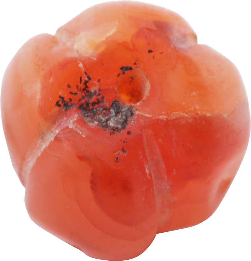 FINE VIKING MELON FORM GEM STONE BEAD 850-1050 AD: Spherical carnelian deeply ribbed to melon form, 0.52” length and 0.54” diameter. Very small conically drilled stringing hole. Probably requires a wire if restrung. Fine patina with a litt