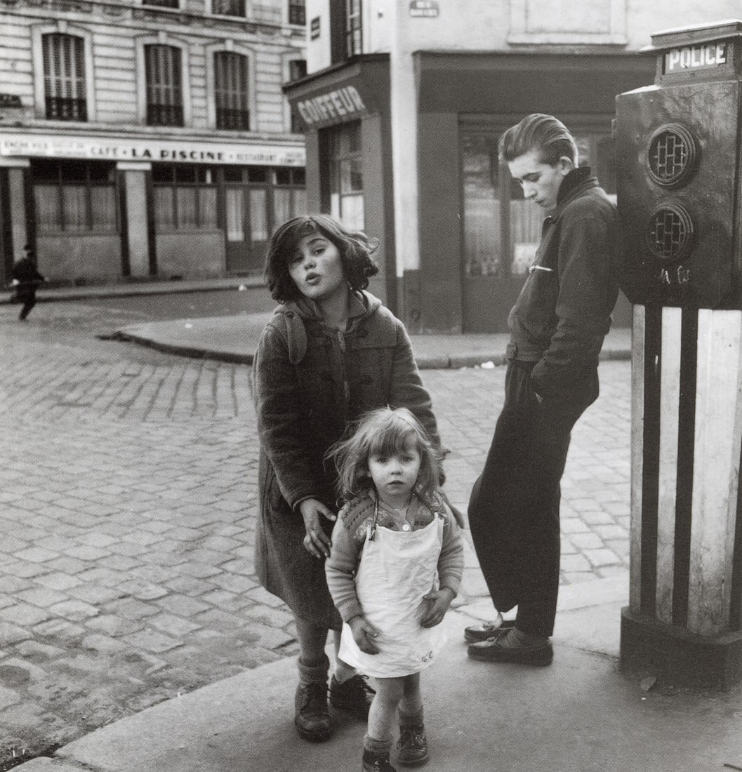 ROBERT DOISNEAU - The Kids In Place Hebert, 1957: Artist: Robert Doisneau Title: The Kids In Place Hebert, 1957 Medium: Photo Litho, 1997, Italy Dimensions: 8.25x8.6" Description: Heat Wax Mounted on 11x14" Conservation Board Artist Bio: Robert Doisn