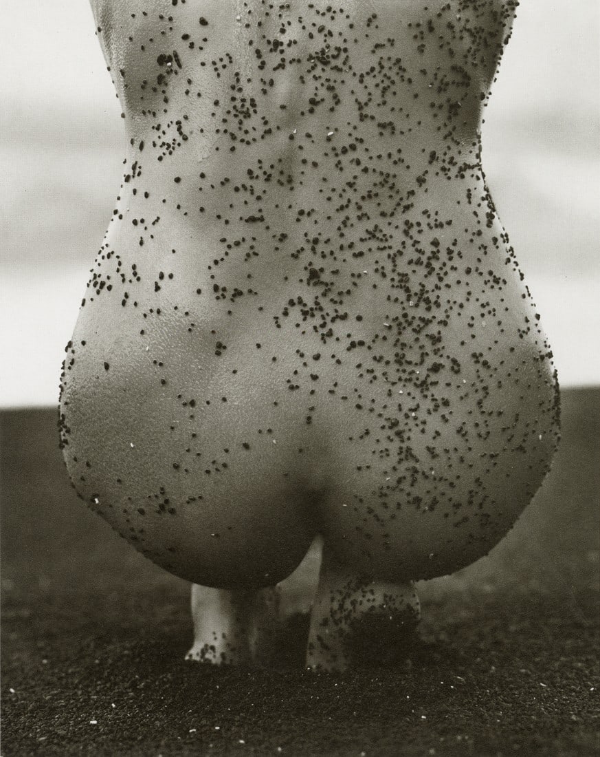 HERB RITTS - Female Figure with Black Sand, Hawaii 1989: Artist: Herb Ritts Title: Female Figure with Black Sand, Hawaii, 1989 Medium: Photo Litho, 1989, Hong Kong Dimensions: 6.5x8.15" Description: Heat Wax Mounted on 8.5x11" Conservation Board Artist Bio:
