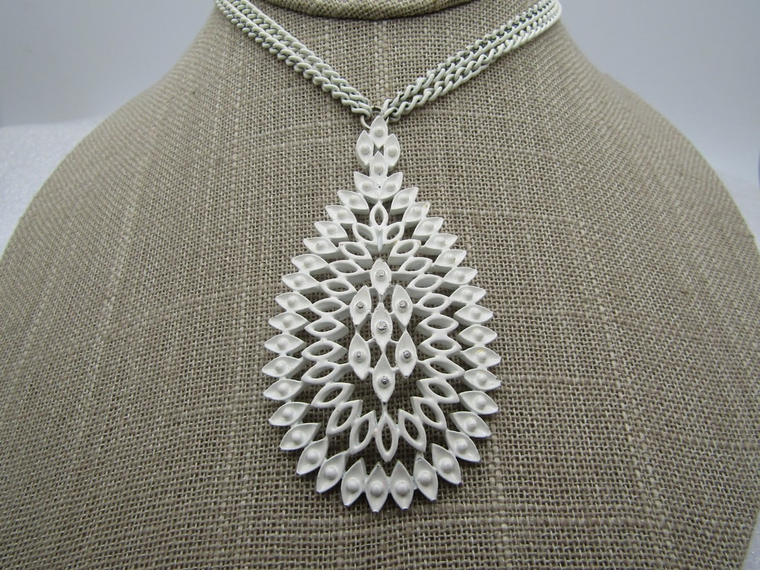 Vintage Monet White Enameled Necklacd, Double Strand, 26", 1960's: Vintage Monet White Enameled Necklacd, Double Strand, 26", 1960's. The pendant is teardrop shaped at 2.75" tall and 1.5" wide. White enameled with open marquise accents and closed with the same shape 