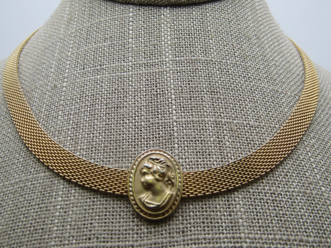 Vintage Mesh Cameo Choker Style Necklace, 19.5", 1960's: Vintage Mesh Cameo Choker Style Necklace, 19.5", 1960's. Gold tone with hook clasp. The mesh is appx. 6mm wide and at the center is an oval cameo that is appx. 3/4" long and 1/2" wide. On the ends of 