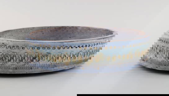 Upsala-Ekeby bowl in glazed ceramics. Beautiful glaze in light blue shades. Striped design. Mid-20th: Upsala-Ekeby bowl in glazed ceramics. Beautiful glaze in light blue shades. Striped design. Mid-20th century. Measures: 20 x 5 cm. In excellent condition. Reserve: $140.00 Shipping: Domestic: Shipping