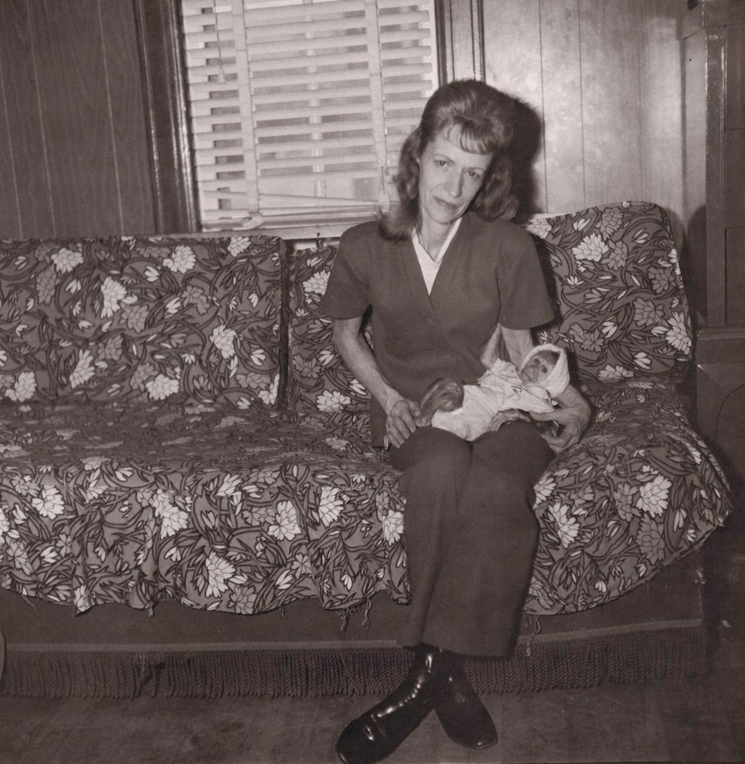 DIANE ARBUS - A Woman with her baby monkey, NJ, 1971: Artist: DIANE ARBUS Print Title: A Woman with her baby monkey, NJ, 1971 Medium: Photoengraving Printed 1970’s in the USA Image size (inches) approx. 8 x 8” Diane Arbus (1923 –1971),w