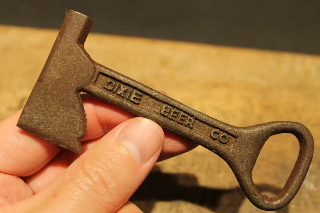 Cast Iron Dixie Beer Bottle Opener Fireman Axe Hatchet: 4 3/8" x 1 7/8" wide Well made reproduction antique cast iron "Dixie Beer Co" Bottle Opener Reserve: $8.00 Shipping: Domestic: Flat-rate of $6.00 to anywhere within the contiguous U.S. International: 