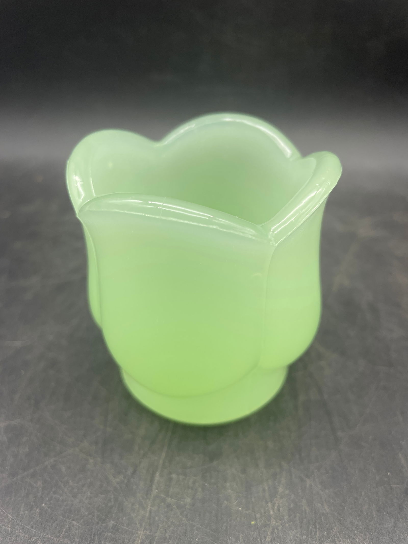 VINTAGE JADEITE GREEN GLASS VOTIVE CANDLE HOLDER TULIP: Title: VINTAGE JADEITE GREEN GLASS VOTIVE CANDLE HOLDER TULIP Date/Period: unknown Dimension: approx 2.5" tall Material: glass Additional Information: VINTAGE GREEN GLASS VOTIVE CANDLE HOLDER 2.5" JAD