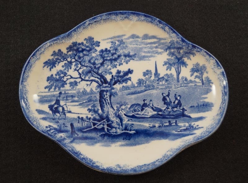 Child’s China Blue Undertray 7” Humphrey’s Clock: Title: Child’s China Blue Undertray 7” Humphrey’s Clock Dimension: 7” long x 5 ½” wide. Date: Ca. 1894-1902 Additional Information: Antique Children’s China Bl