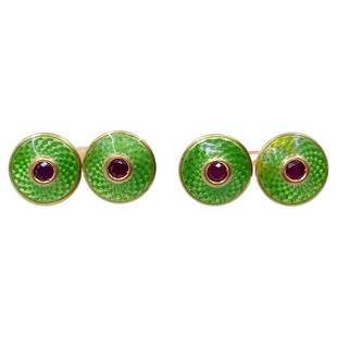 French Guilloche Enamel Ruby Cuff links: These French cufflinks, crafted in the 1930s, showcase a vibrant and sophisticated design. Made with 18K gold, the cufflinks feature a bright green guilloche enamel pattern that adds a touch of