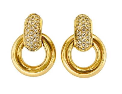 Chaumet Gold Diamond Earrings: ES T000 Product details: DESIGNER: Chaumet CIRCA: 1980’s MATERIALS: 18k Yellow Gold GEMSTONE: Diamond WEIGHT: 17.5 grams MEASUREMENTS: 1 1/8" x 3/4" HALLMARKS: Chaumet, 750 ITEM DET