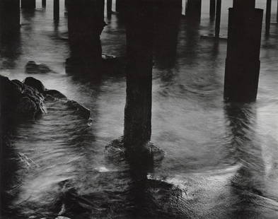 WYNN BULLOCK - Pilings Under Cannery Row, 1958: Artist: Wynn Bullock Title: Pilings Under Cannery Row, 1958 Medium: Photo Litho, 1971, USA Dimensions: 9.95x7.85" Description: Heat Wax Mounted on 11x14" Conservation Board Artist Bio: Wynn Bullock (1