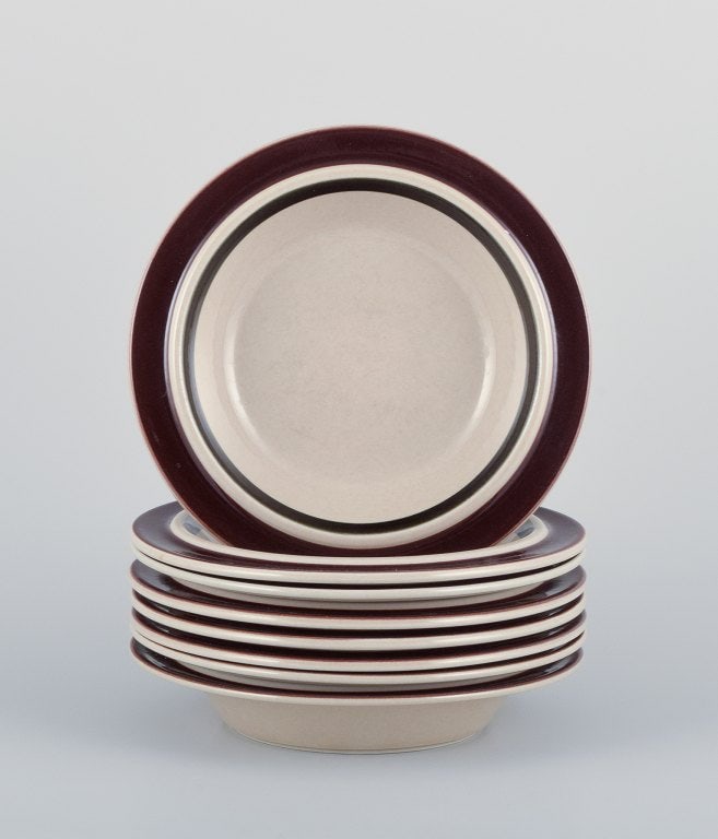 Raija Uosikkinen and Ulla Procopé for Arabia, Finland. A set of eight "Ruija" deep plates in: Raija Uosikkinen (1923–2004) and Ulla Procopé (1921–1968) for Arabia, Finland. A set of eight "Ruija" deep plates in stoneware with brown decoration. From the 1960s/1970s. Marked. In