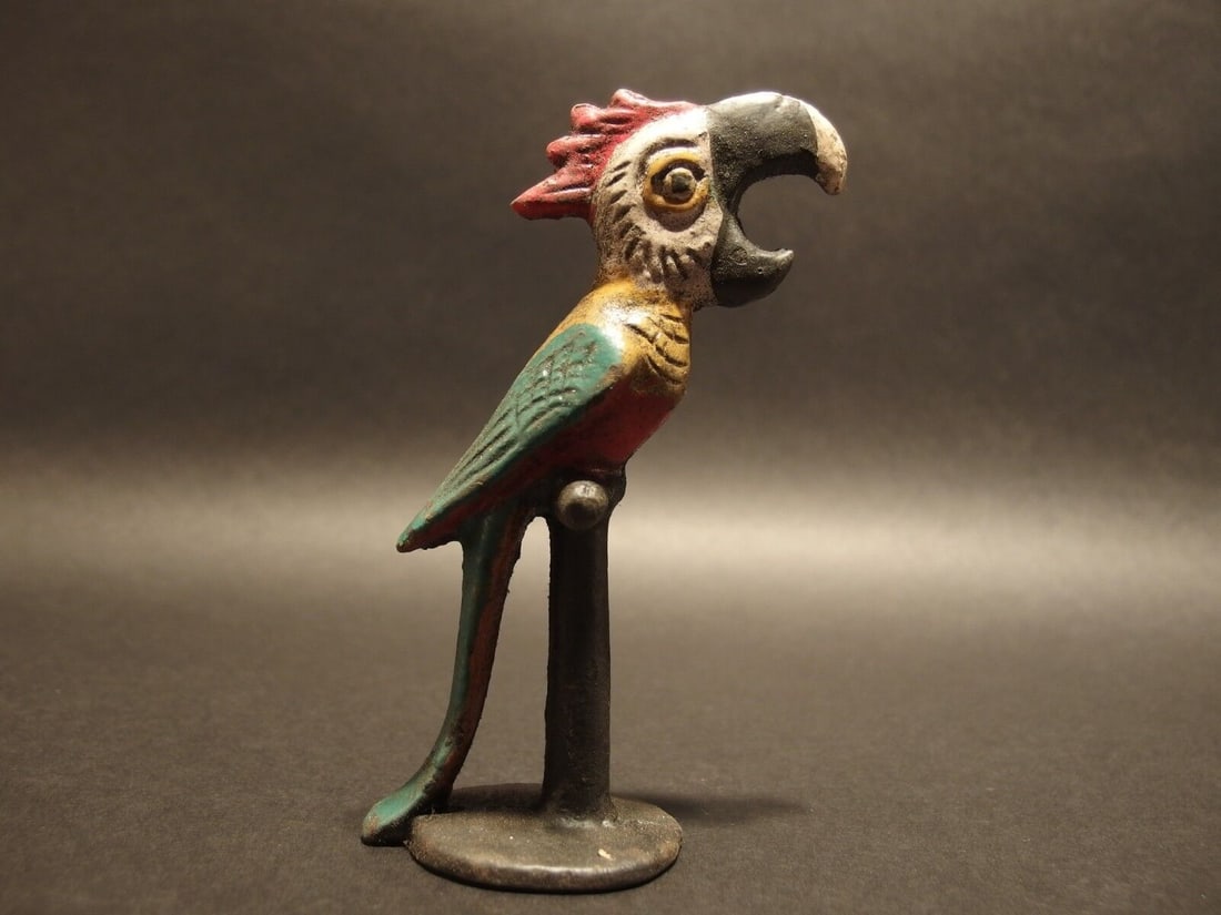 Cast Iron Parrot Beer Bottle Opener bar tool: 5 1/4" Tall Great reproduction cast iron bottle opener. This piece was made to look just like an antique, but is new. Great for use or display! Reserve: $20.00 Shipping: Domestic: Flat-rate of $8.00 t