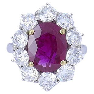 Vintage Burma Ruby Diamond Gold Cluster RING AGL Estate Jewelry: VK JOTOO Ruby Diamond 14 karat White Gold Ring A classic vintage ruby and diamond cluster ring made of 14k white gold. The gorgeous Burma ruby in the center is surrounded by ten round brilliant cut