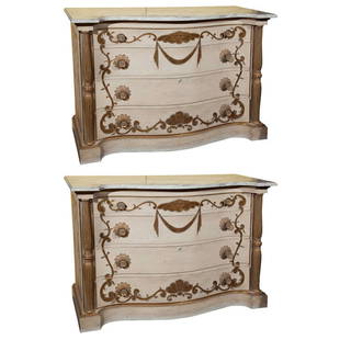 Maison Jansen, Commodes, Parcel Gilt, Painted Wood, Marble, France, 1950s: About the Item Pair of attractive French commodes, circa 1950s, the white serpentine marble atop a white distress-painted and parcel-gilt conforming case, fitted with four graduating drawers decorated