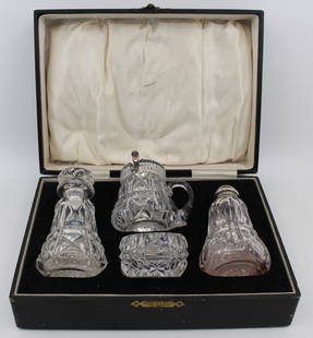 Cased John Walsh Crystal & Silver Cruet Set 1925: Cased John Walsh Crystal & Silver Cruet Set 1925 Early 20th c., English Made by John Walsh Crystal, stamped to the underside Cut glass . Sterling silver mount. Sterling silver hallmark; E Edmonds, 192