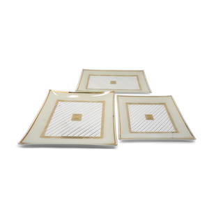 Georges Briard Mid-Century Modern Gold Glass Trays - Set of Three: A set of three George Briard glass trays with gold geometric and pinstripe patterned design in three sizes. Square plates are 10" x 10" and 12" x 12", and the rectangular plate is 9" x 14". Perfect fo