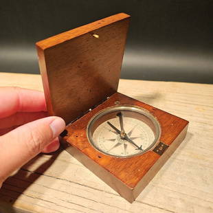 Brass Wood Box Compass: 3.3? x 3.3? x 0.9? The antique-style wood box compass is a captivating tribute to the navigational instruments of old. Encased in a beautifully crafted wooden box, it evokes a sense of timeless explor