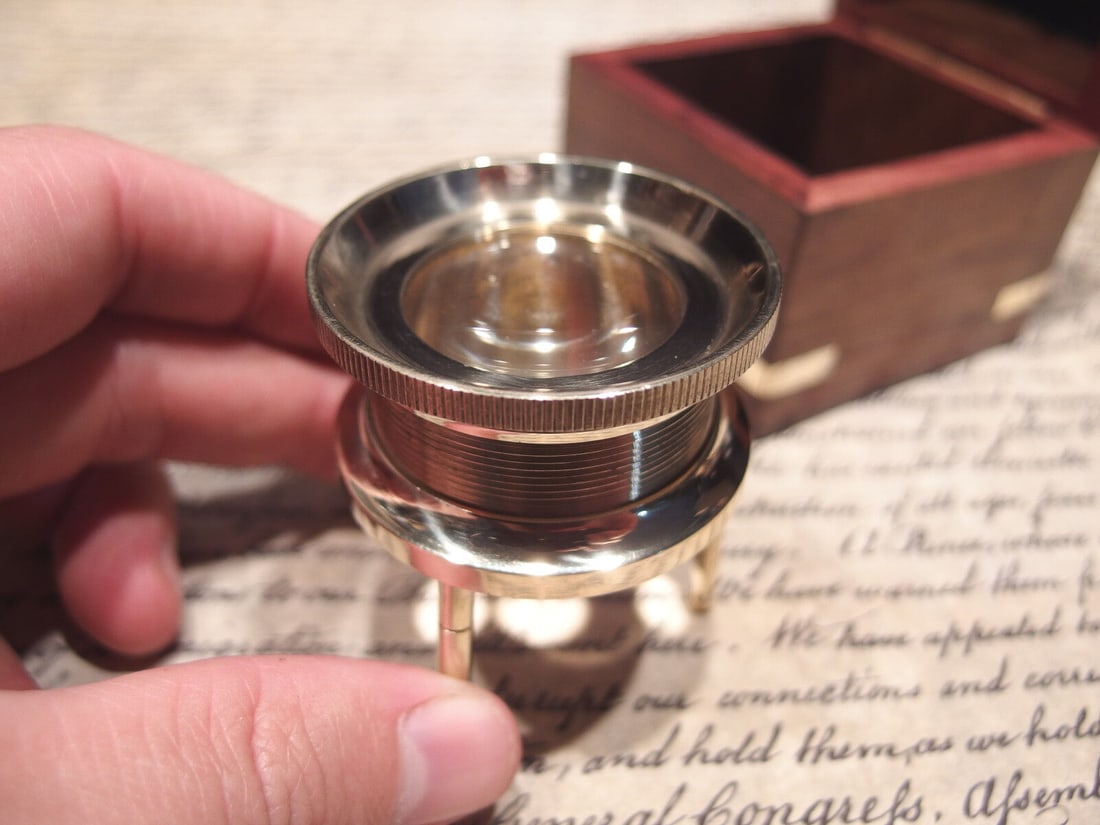 Brass Chart Map Glass Magnifying Desk Lens Magnifier w Box: Glass is 1 7/8" Wide x 2" High,.. adjustable to 2 1/2" box is 2 3/4" x 2 3/4" x 2 3/4" Nice reproduction of an antique magnifying lens. Nice heavy quality thick glass. This piece slides along the surf