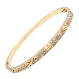 Cartier 18k Yellow Gold Love Pave Diamond Small Bangle Bracelet Size 18 Cert.: Cartier 18k Yellow Gold Love Pave Diamond Small Bangle Bracelet Size 18 Cert. Cartier 18k Yellow Gold Love Pave Diamond Small Bangle Bracelet Size 18 Cert. Product Description About This Piece: