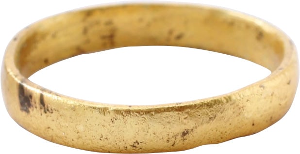 VIKING WOMAN’S WEDDING RING C.850-1050 AD 6 ¼+: Gilt bronze, size 6 ¼+. Rounded face band, 3.0mm width. Professionally refurbished with the 24karat gold surface restored. See the reference image which shows the process. Jewelry gift boxed with