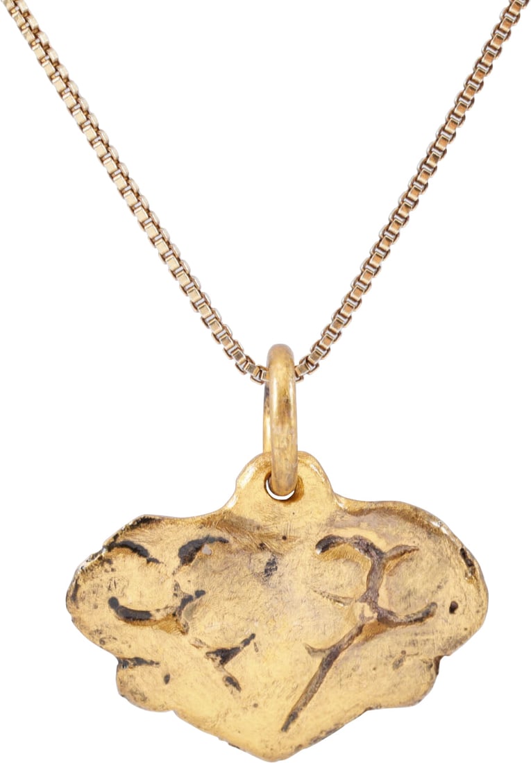 VIKING HEART PENDANT NECKLACE, 850-950 AD: Just over 1/2” (0.53”) height plus the suspension loop. Made by the open face mold method. Broad heart form of slightly domed section. The field with a trefoil of iconic form with scrolled