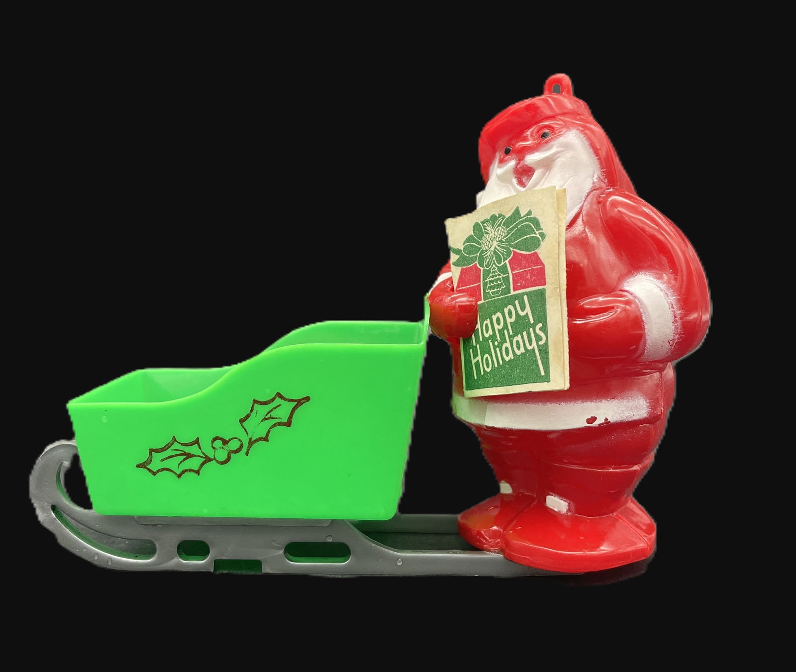 VINTAGE CHRISTMAS HARD PLASTIC - SANTA RIDES GREEN SLED CANDY CONTAINER (1 of 8)