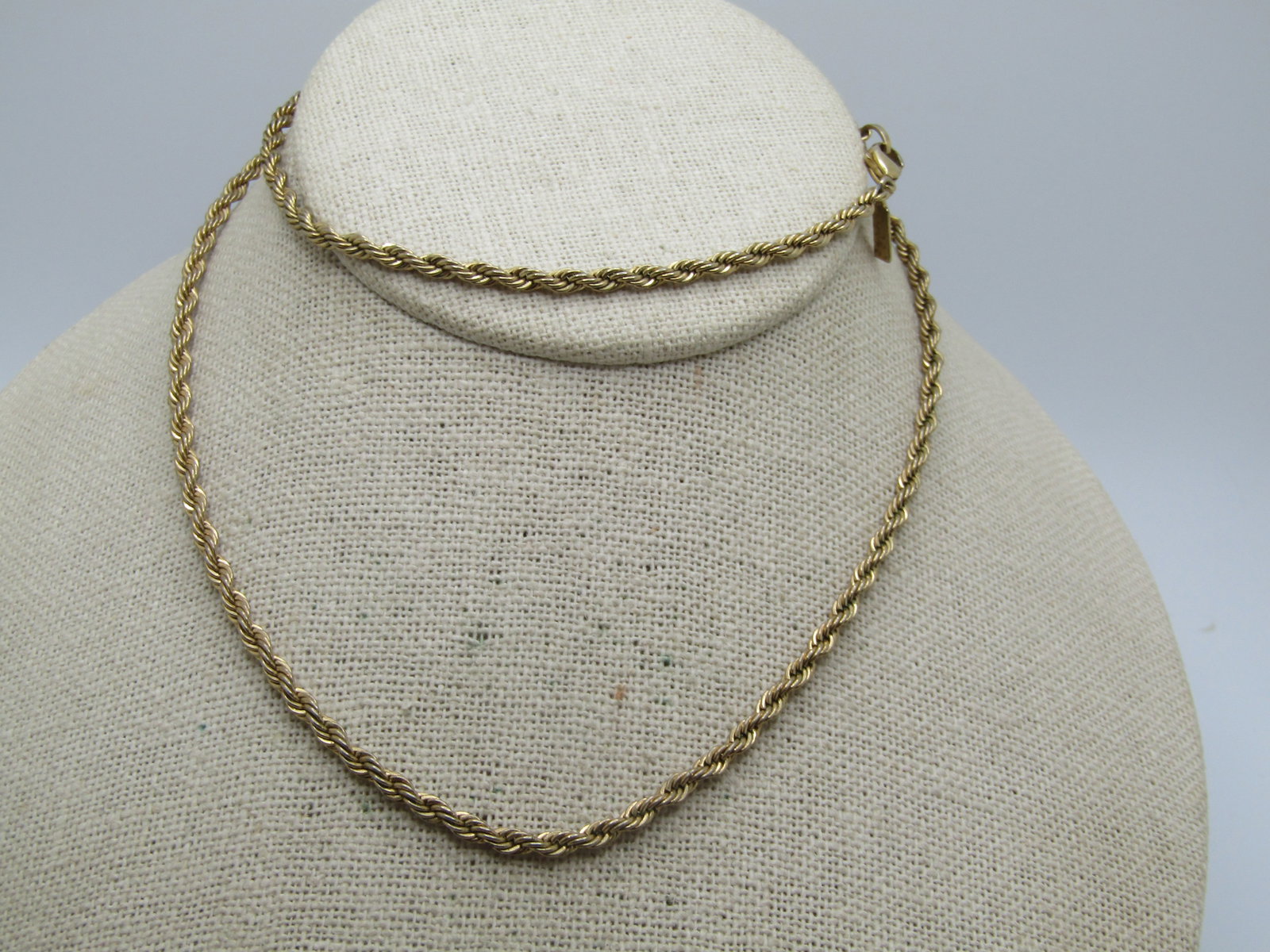 Vintage 14kt Plated Rope Chain 24", 3mm wide, 1980's: Vintage 14kt Plated Rope Chain 24", 3mm wide, 1980's. Unisex. 14kt gold plated rope chain, yellow gold. 3mm wide and 24" wide with a lobster clasp. Tag is marked 14kt G.P. and Korea Very good conditio