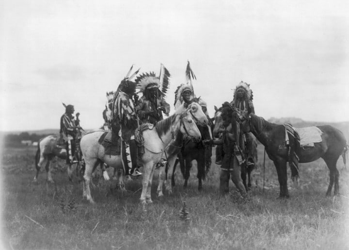 1907, THE PARLEY, (DAKOTA INDIANS); BY EDWARD S. CURTIS: TITLE: 1907, THE PARLEY, (DAKOTA INDIANS); BY EDWARD S. CURTIS ARTIST/SOURCE: EDWARD SHERIFF CURTIS, (AMERICAN, 1868-1952) MEDIUM: PUBLISHED CONTEMPORARY PHOTOLITHOGRAPH, WITH EXTENSIVE RESTORATION; A