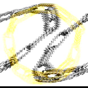 Carlo Weingrill 18k Two-Tone Gold Rope Chain Bracelet: DESIGNER: Carlo Weingrill CIRCA: 1990’s MATERIALS: 18k White and Yellow Gold WEIGHT: 53.9 grams MEASUREMENTS: 8 1/8” x 3/8” HALLMARKS: 750 ITEM DETAILS: A glossy vintage rope